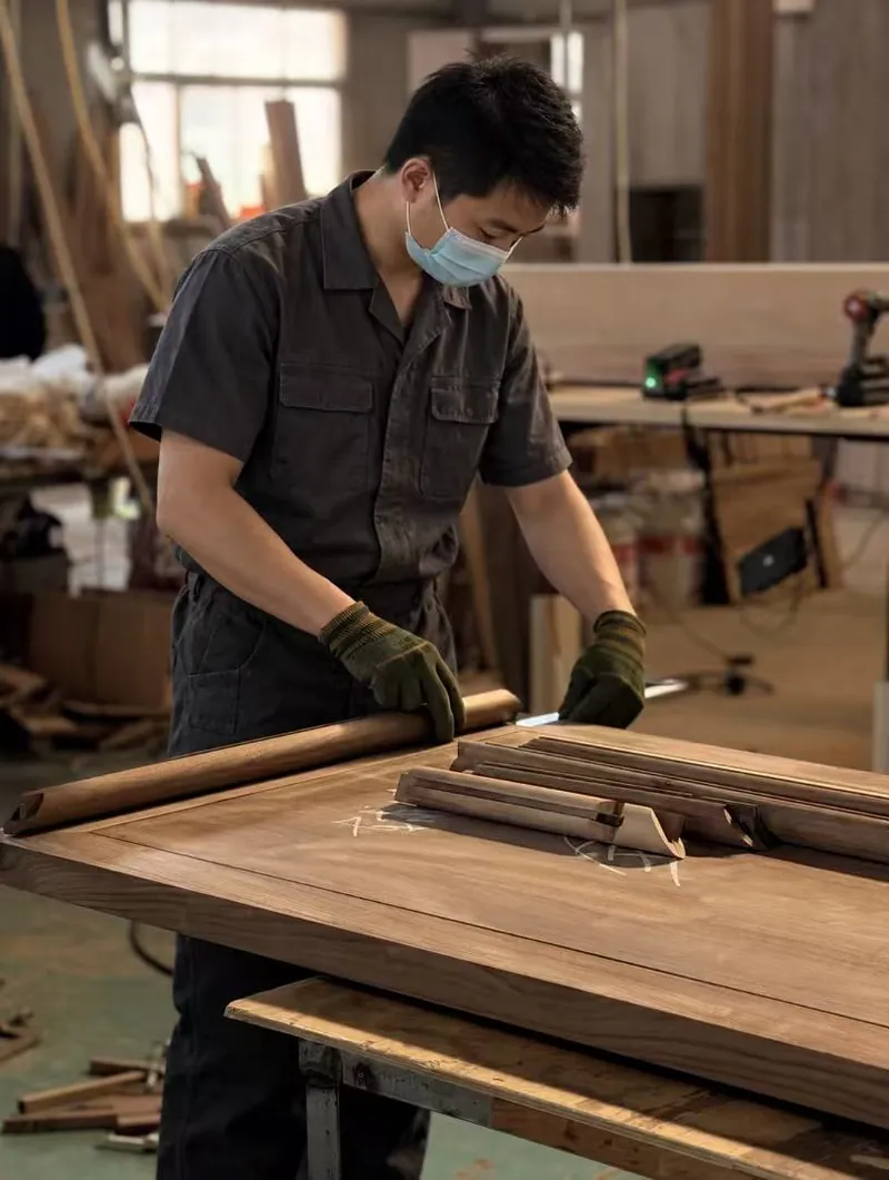 Craftsman shaping solid wood
